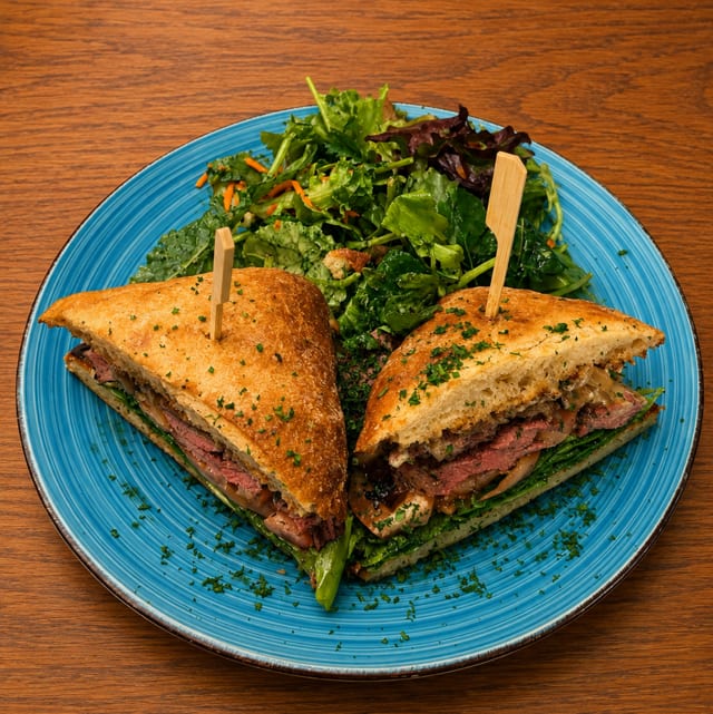 Flat Iron Steak and Arugula Sandwich.